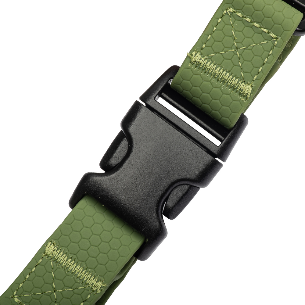 Secure side-release buckles on green waterproof dog harness for easy fit