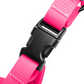 Secure side-release buckles on pink waterproof dog harness for easy fit