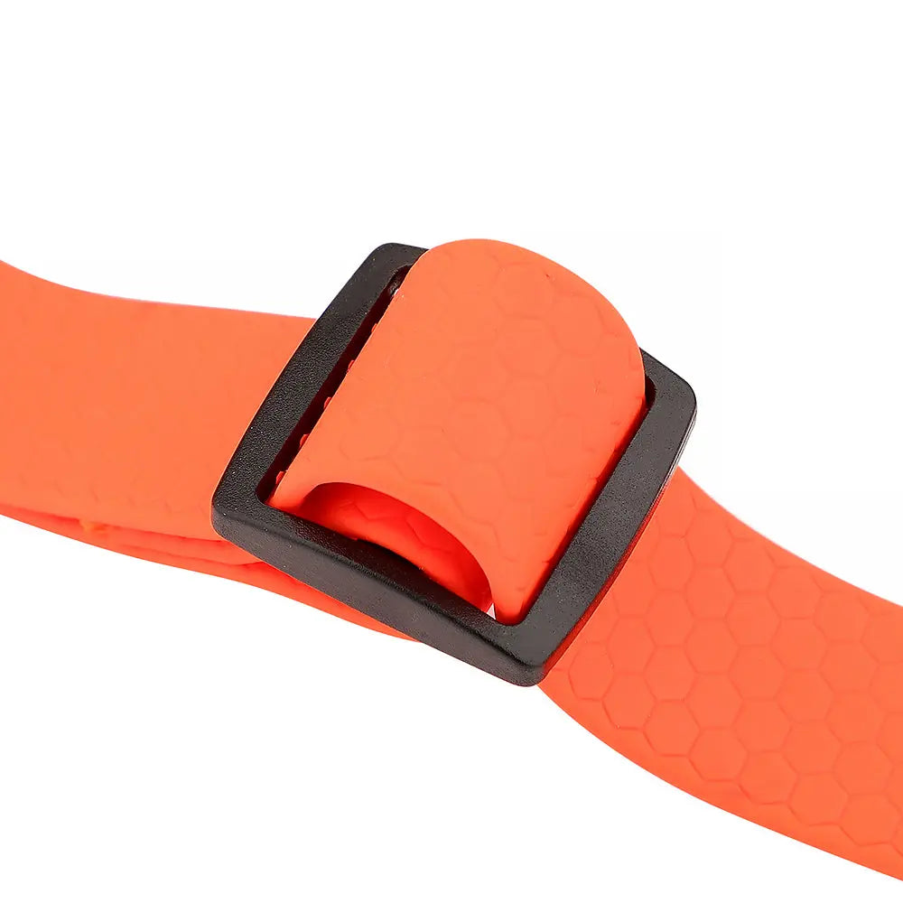 Adjusting the straps on a high-visibility orange waterproof dog harness for a secure and comfortable fit