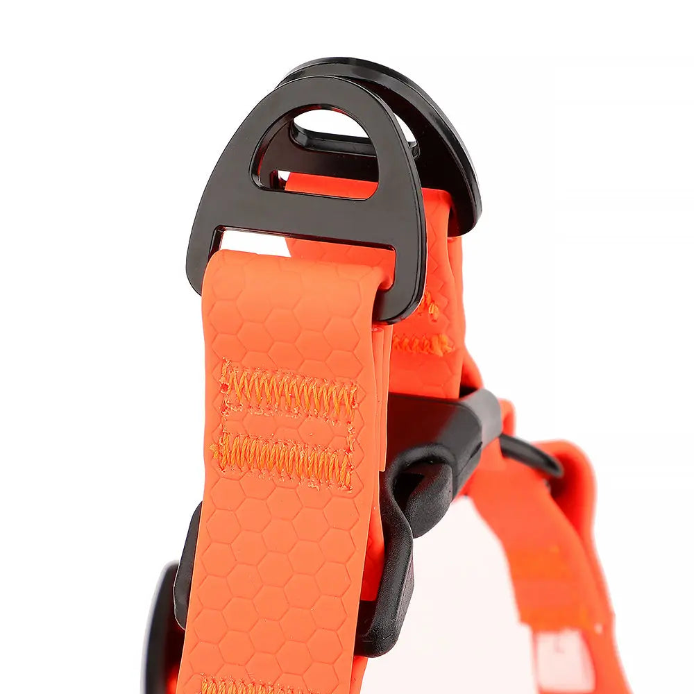 Close-up of heavy-duty D-rings on high-visibility orange waterproof dog harness